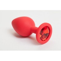 Красная силиконовая пробка с красным кристаллом - 9,5 см. Красная силиконовая пробка с красным кристаллом - 9,5 см.