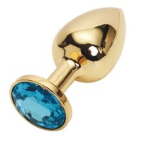 Золотистая металлическая анальная пробка с голубым стразом - 7,6 см. Золотистая металлическая анальная пробка с голубым стразом - 7,6 см.
