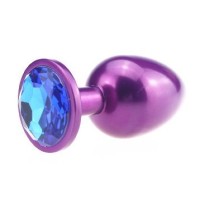 Фиолетовая анальная пробка с синим стразом - 7,6 см. Фиолетовая анальная пробка с синим стразом - 7,6 см.