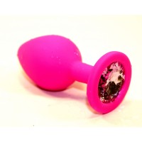 Розовая силиконовая анальная пробка с розовым стразом - 7 см. Розовая силиконовая анальная пробка с розовым стразом - 7 см.