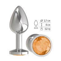 Серебристая анальная втулка с оранжевым кристаллом - 7 см. Серебристая анальная втулка с оранжевым кристаллом - 7 см.