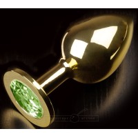 Золотистая анальная пробка с салатовым кристаллом - 9 см. Золотистая анальная пробка с салатовым кристаллом - 9 см.