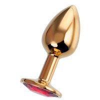Золотистая гладкая коническая анальная пробка с красным кристаллом - 7 см. Золотистая гладкая коническая анальная пробка с красным кристаллом - 7 см.