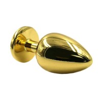 Золотистая алюминиевая анальная пробка с темно-фиолетовым кристаллом - 6 см. Золотистая алюминиевая анальная пробка с темно-фиолетовым кристаллом - 6 см.