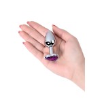 Серебристая коническая анальная пробка с фиолетовым кристаллом-сердечком - 7 см