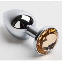 Серебристая анальная пробка с желтым кристаллом - 8,2 см. Серебристая анальная пробка с желтым кристаллом - 8,2 см.