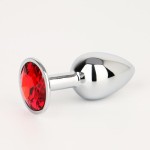 Серебристая анальная втулочка с красным кристаллом - 7 см