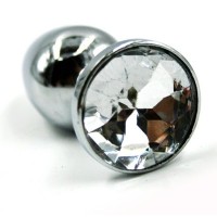 Малая анальная пробка из алюминия с прозрачным кристаллом - 7 см. Малая анальная пробка из алюминия с прозрачным кристаллом - 7 см.