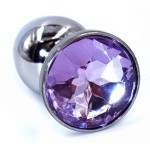 Серебристая анальная пробка с фиолетовым стразом - 7 см