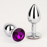 Серебристая анальная втулочка с фиолетовым кристаллом - 7 см