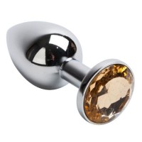 Серебристая анальная пробка с желтым кристаллом - 7,6 см. Серебристая анальная пробка с желтым кристаллом - 7,6 см.