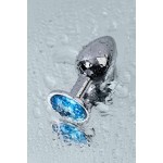 Серебристая конусовидная анальная пробка с голубым кристаллом - 7 см 