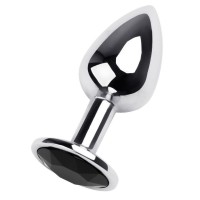 Маленькая коническая серебристая анальная пробка с черным кристаллом - 7 см. Маленькая коническая серебристая анальная пробка с черным кристаллом - 7 см.