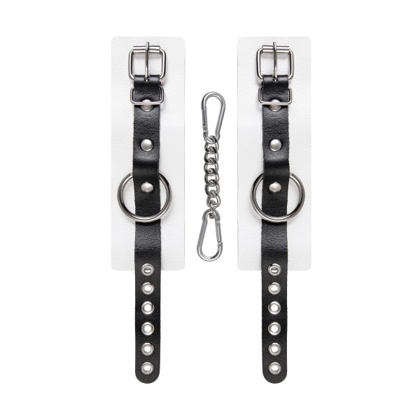 Бело-черные кожаные наручники с одним ремешком с люверсами