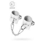Белые мягкие кожаные наручники с люверсами