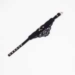 Фигурный чокер с узорами и золотистой фурнитурой Фигурный чокер с узорами и золотистой фурнитурой