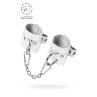 Белые мягкие кожаные наручники с люверсами