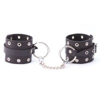Черные кожаные оковы с люверсами Черные кожаные оковы с люверсами