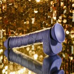 Фиолетовый вибратор на присоске с поступательными движениями Pleasure Rider - 22,2 см.