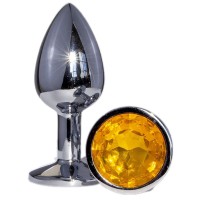 Металлическая анальная втулка с желтым кристаллом - 7,2 см. Металлическая анальная втулка с желтым кристаллом - 7,2 см.