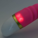 Розовый рельефный вибратор для точки G - 19 см.